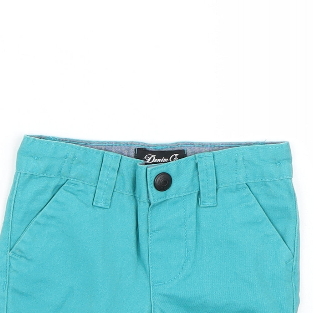 Close-up detail of Denim & Co. boys’ blue cropped trousers, size 6-9, months
