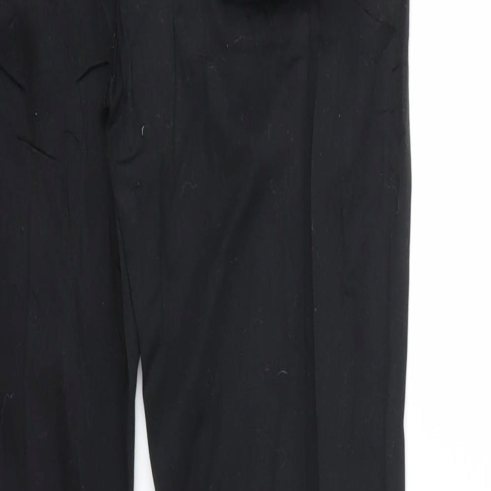 Brand and care label for Mango women’s blue trousers, size UK 26, in, 25-inch leg