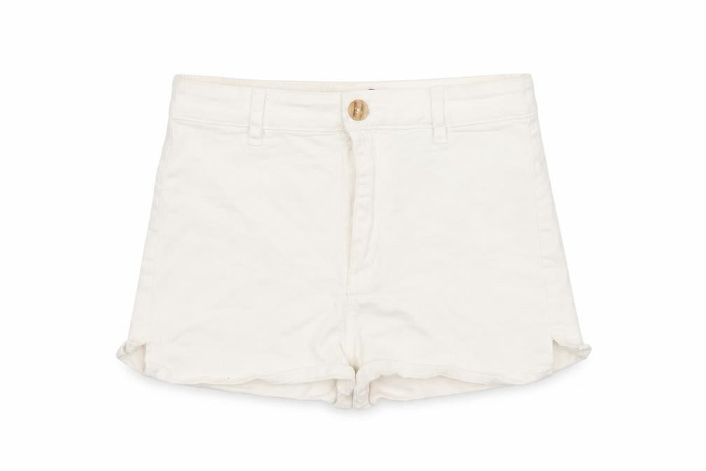 Front view of Divided women’s white cut-off shorts, size UK 8