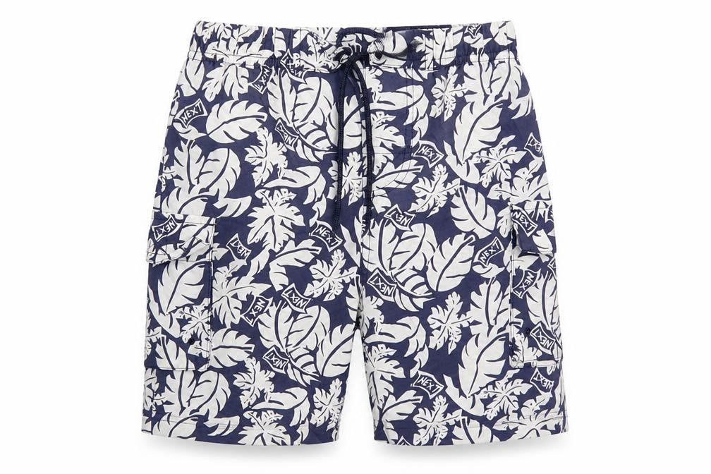 Front view of Next girls’ blue floral paperbag shorts, size 5-6, years - palm leaves