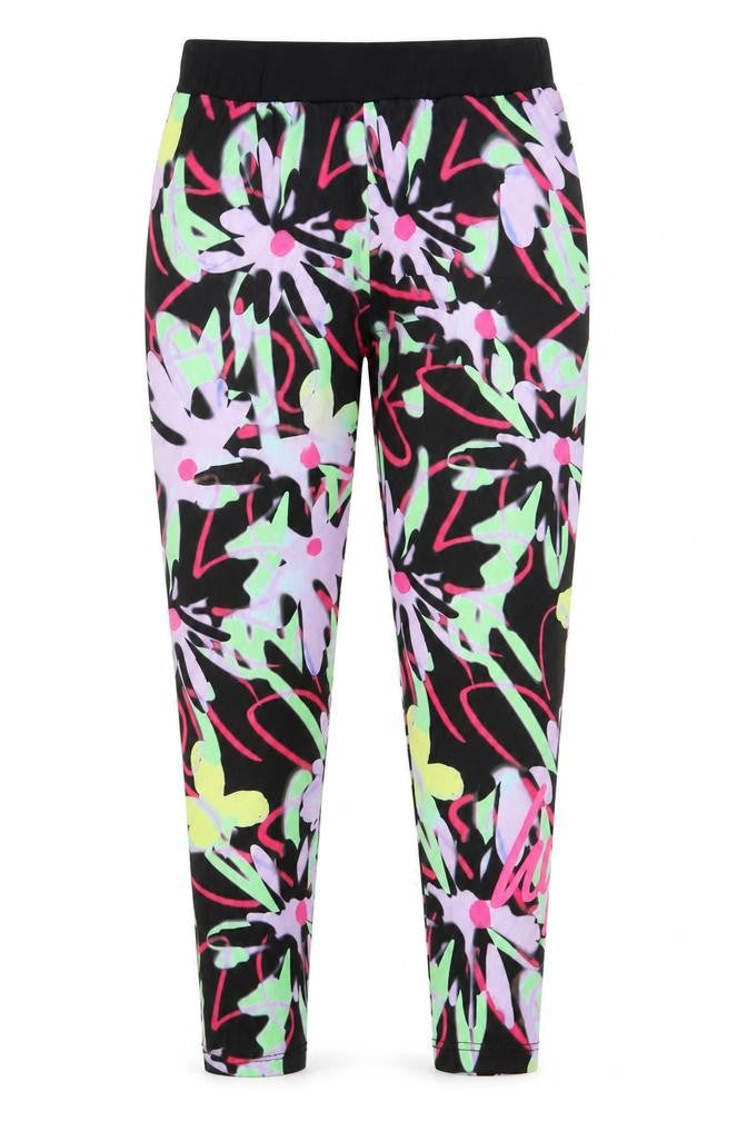 Front view of Hype girls’ multicoloured geometric jegging trousers, size 13, years