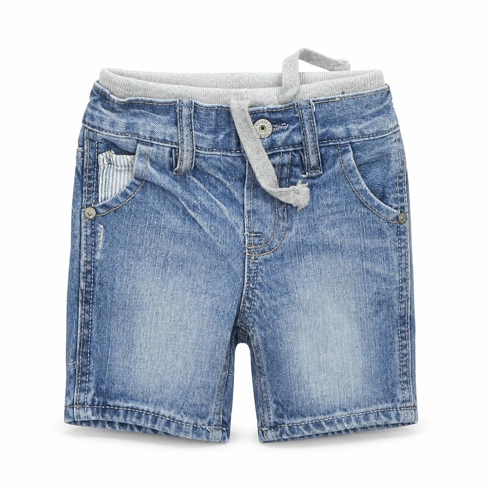 Front view of Gap boys’ blue denim capri jeans, size 6-9, months