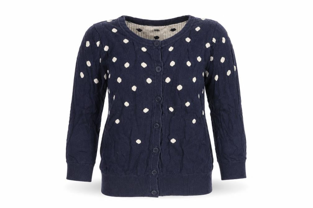 Front view of Warehouse women’s blue polka dot knit cardigan jumper, size UK 8