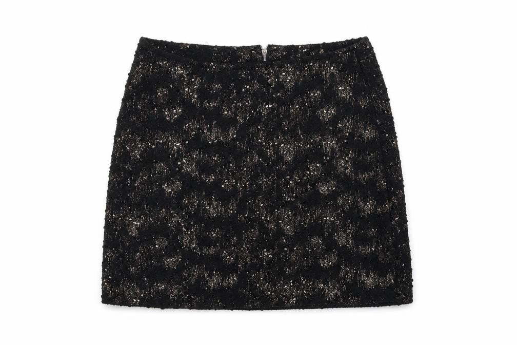 Front view of Next women’s black houndstooth flare skirt, size UK 10