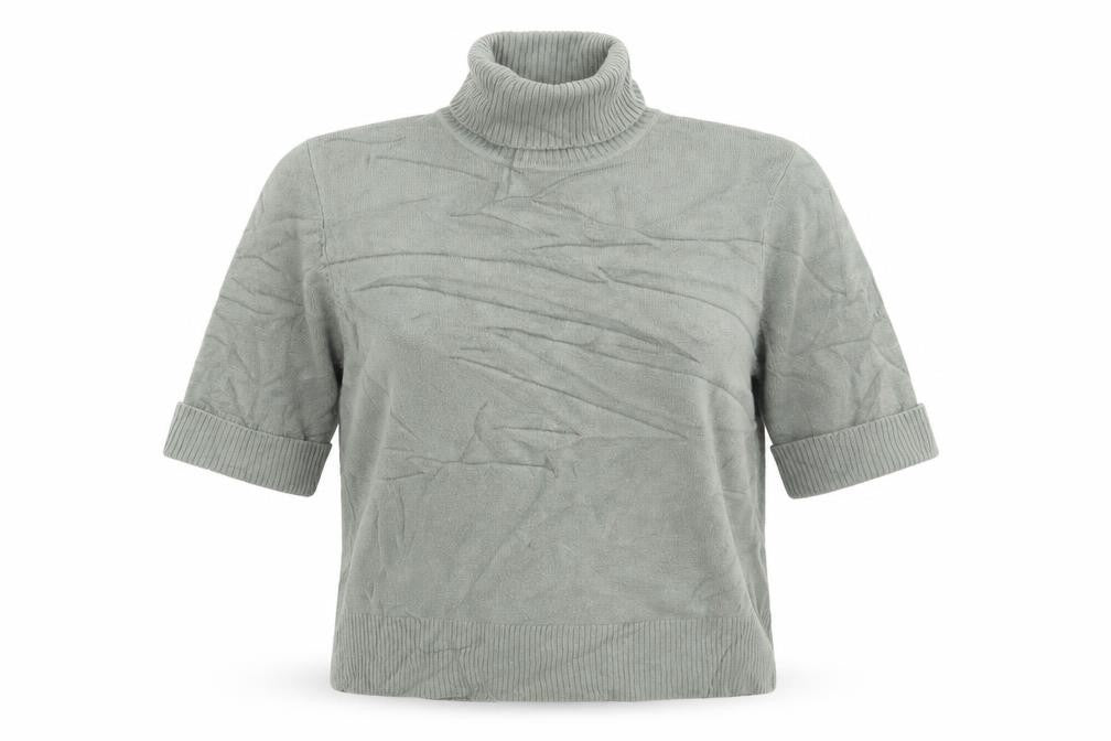 Front view of Essentials women’s green jumper, size UK 14