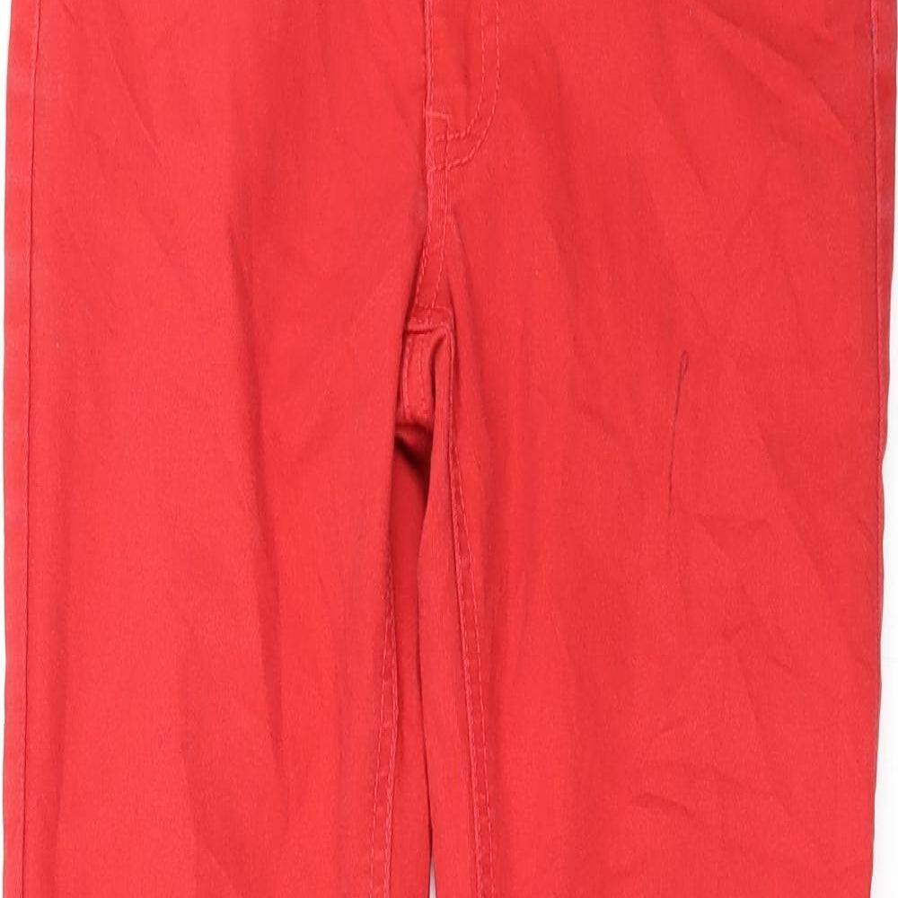 Close-up detail of WOW women’s red straight jeans, size M, 27-inch leg - zip