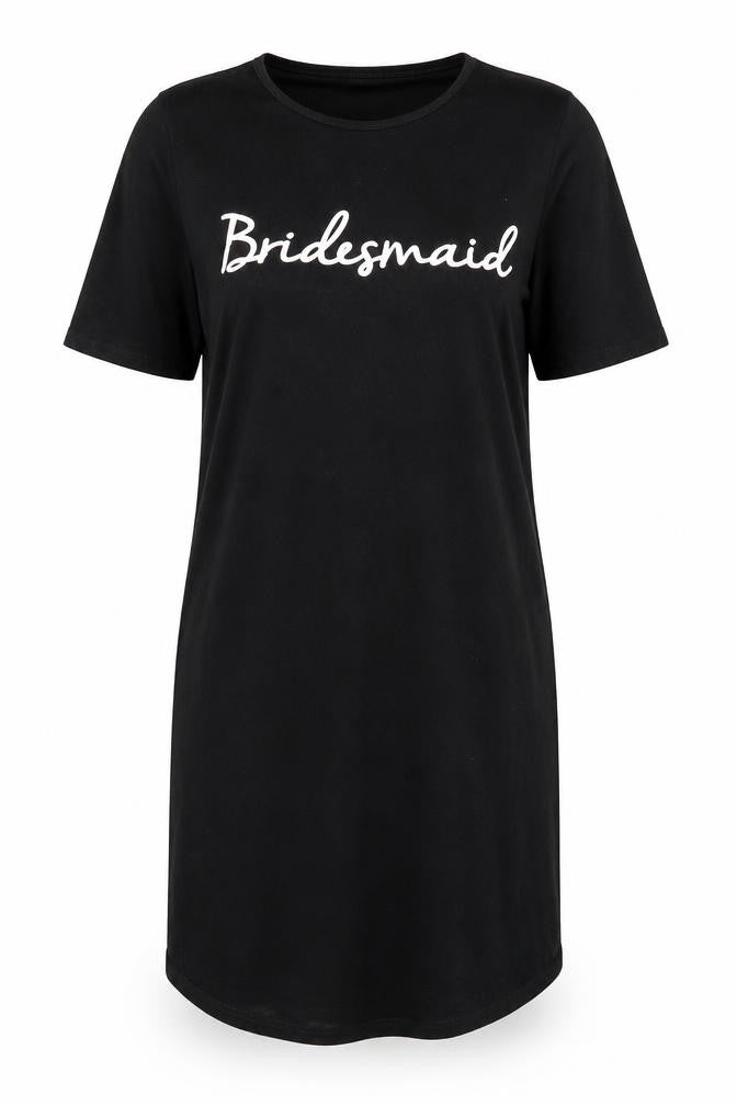 Front view of Boohoo women’s black solid chemise dress, size UK 10, - bridesmaid
