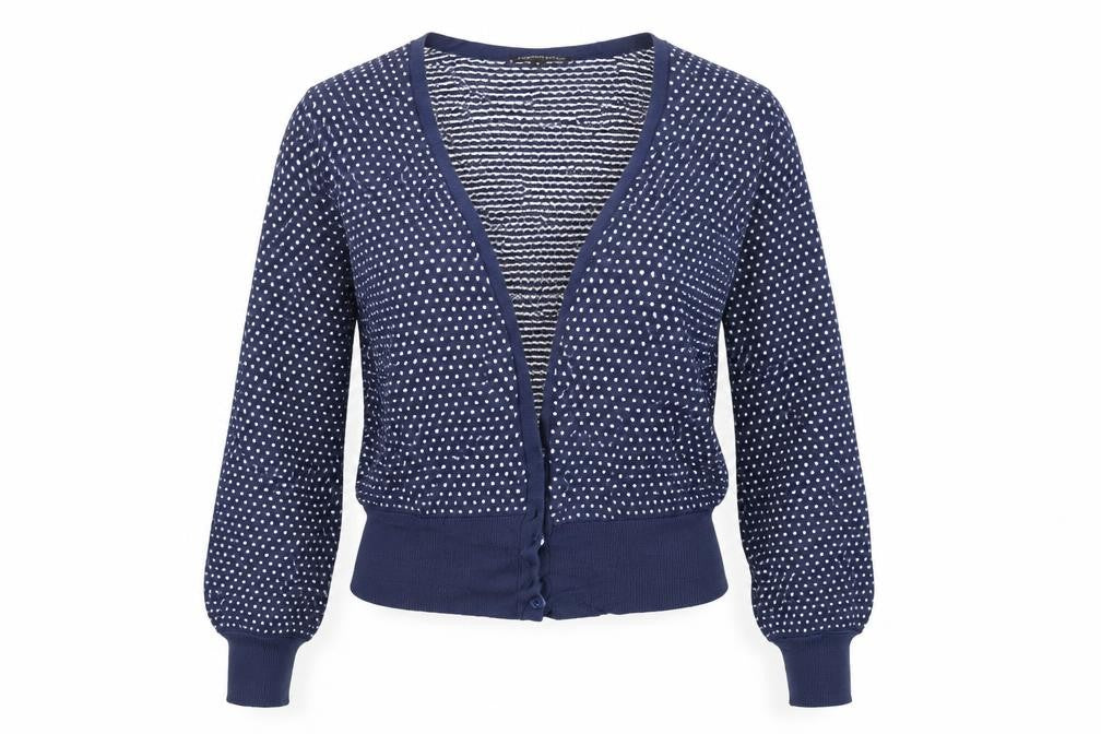 Front view of Limited eddition women’s blue polka dot jumper, size M