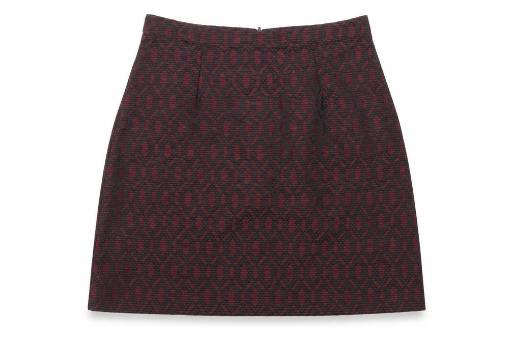 Front view of New Look women’s red geometric mini skirt, size UK 8