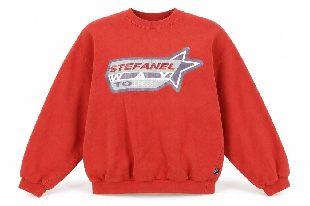 Front view of Stefanel girls’ orange jacquard pullover sweatshirt, size 10, years