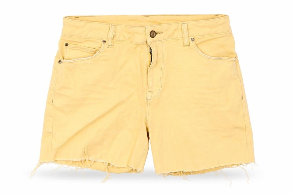 Front view of ASOS women’s orange denim cut-off shorts, size UK 32, in - distressed hem