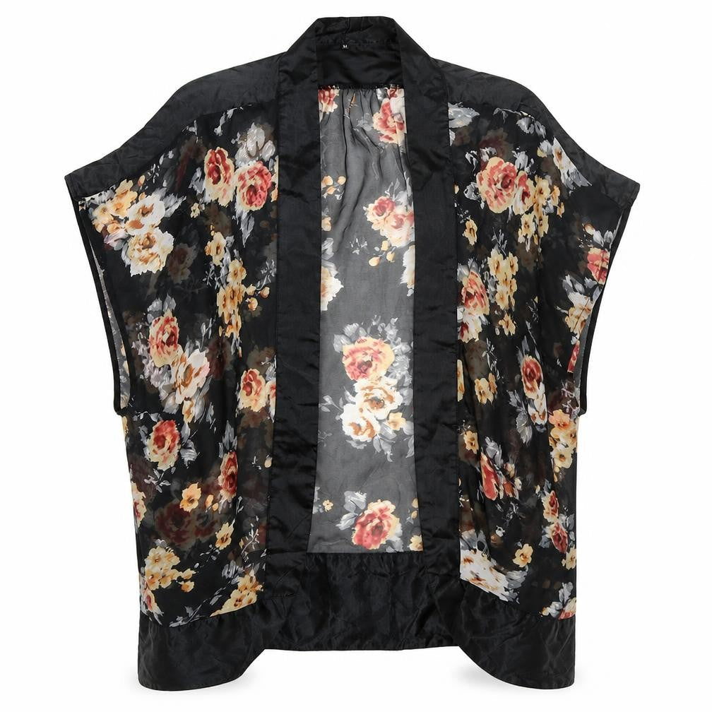 Front view of Preworn women’s black floral cardigan jumper, size M