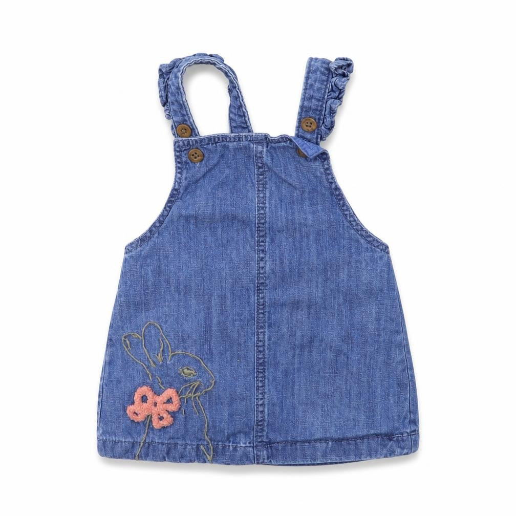 Front view of Marks & Spencer girls’ blue denim pinafore/dungaree dress, size 3-6, months