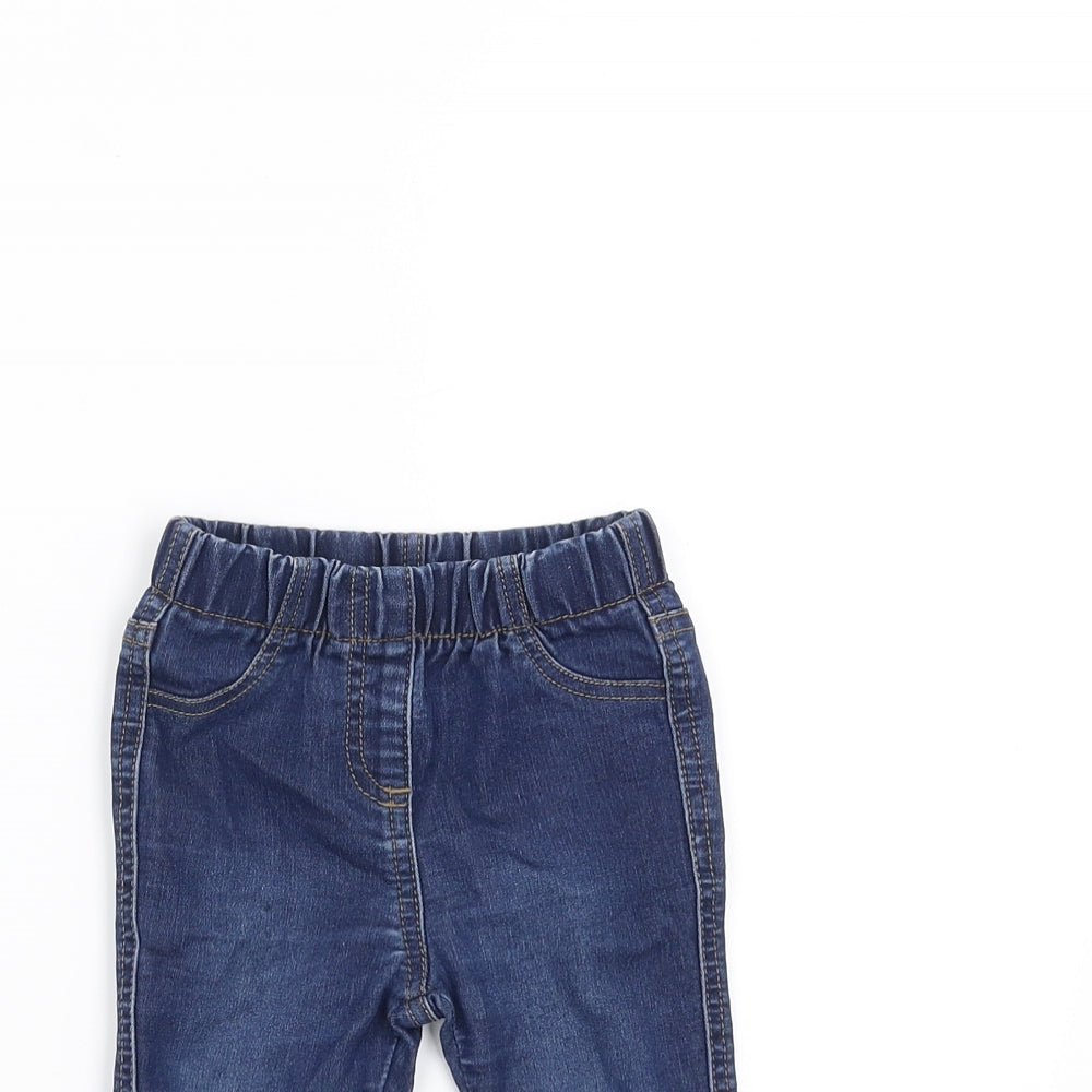 Close-up detail of Matalan girls’ blue denim jeans, size 6-9, months