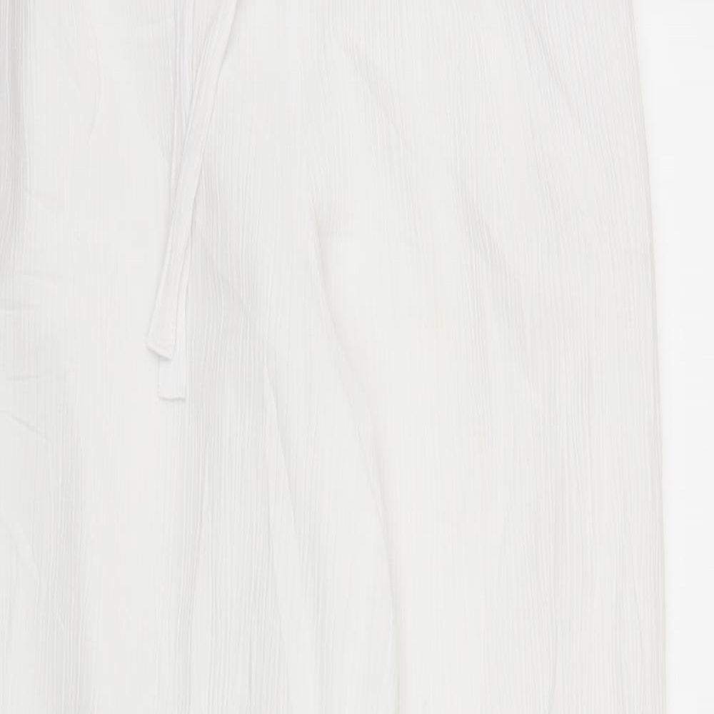 Close-up detail of Canda women’s white bloomer trousers, size UK 12, 29-inch leg