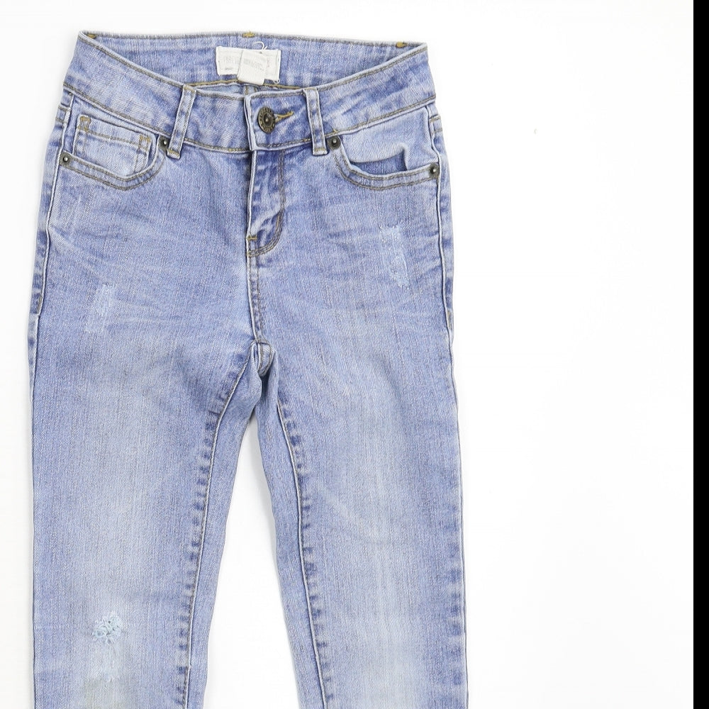 Close-up detail of FOREVER 21 girls’ blue denim skinny jeans, size 7, years