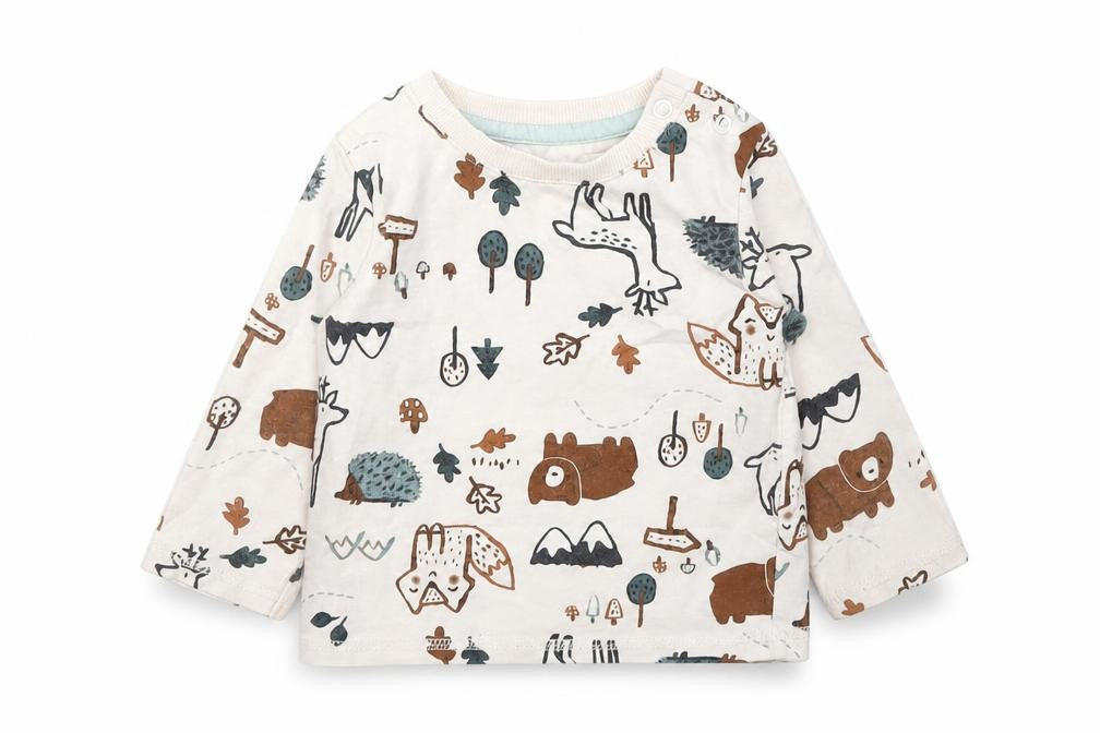 Front view of Nutmeg boys’ white animal print camisole t-shirt, size 6-9, months