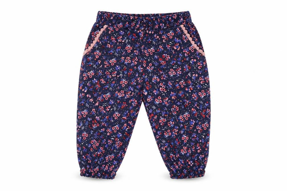 Front view of Primark girls’ blue floral pedal pusher trousers, size 9-12, months