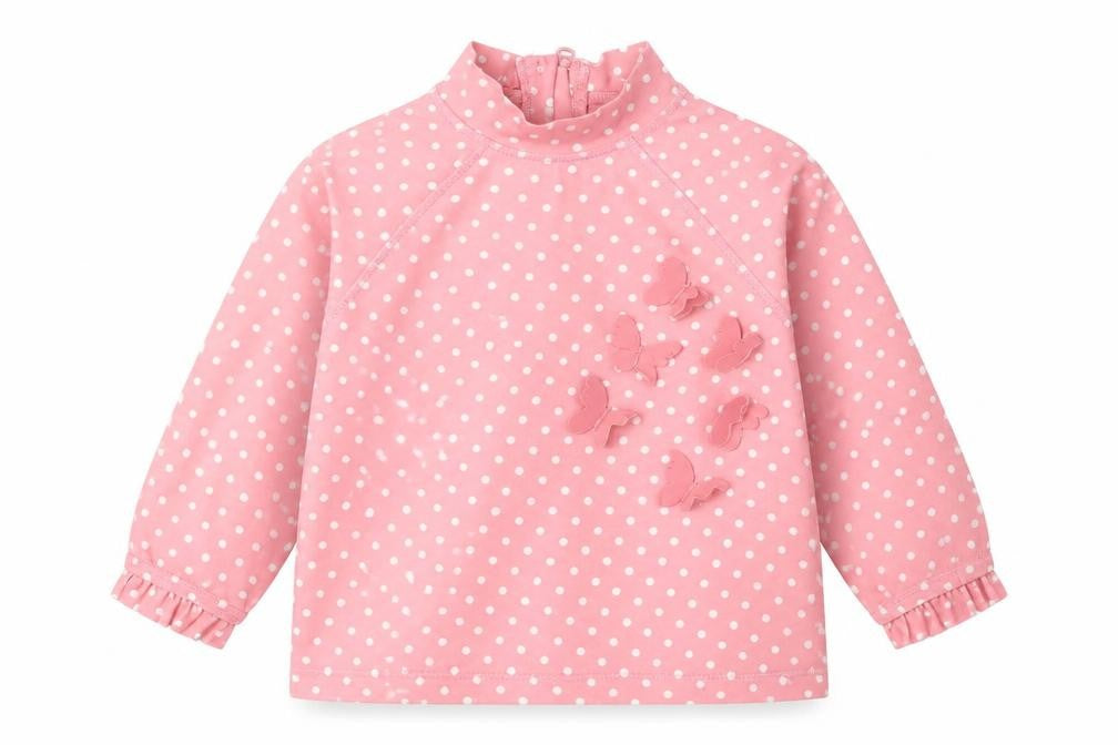Front view of Mothercare girls’ pink polka dot pyjama top, size 9-12, months