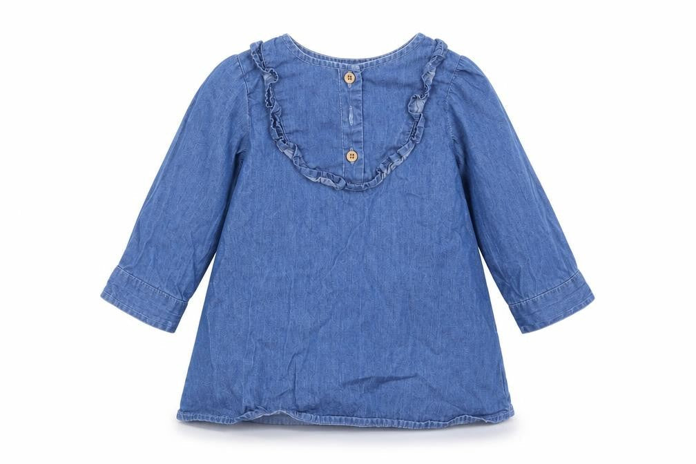 Front view of Primark girls’ blue denim shirt dress, size 6-9, months