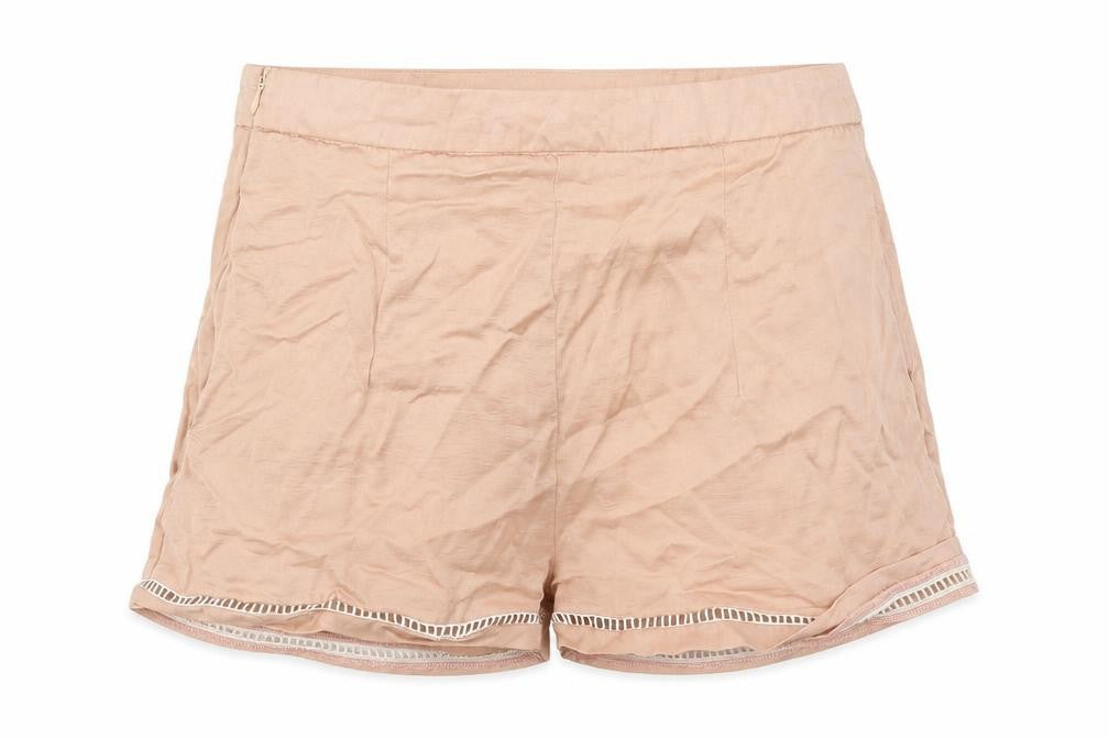 Front view of Missguided women’s pink cut-off shorts, size UK 6