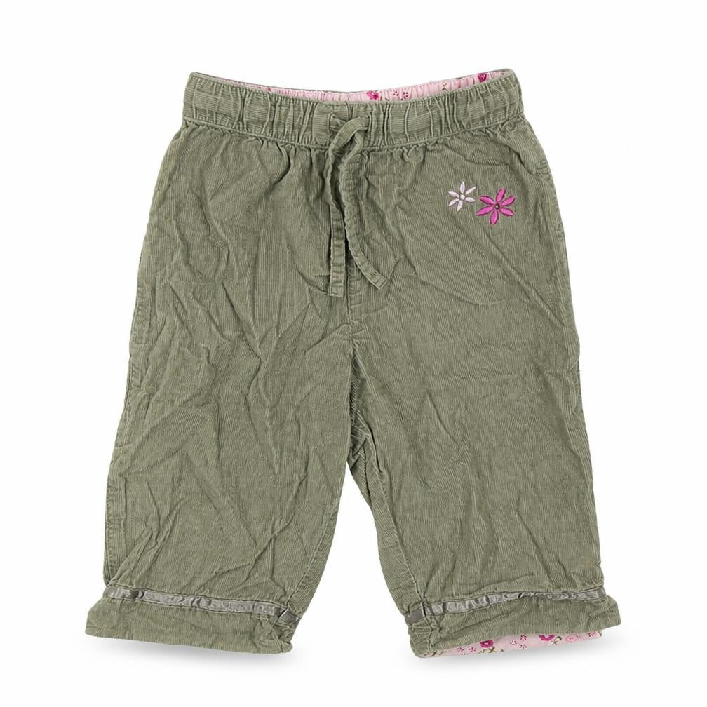 Front view of H&S girls’ green colourblock jogger trousers, size 6-9, months