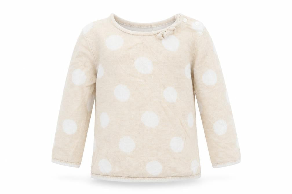Front view of H&M girls’ beige polka dot jumper, size 9-12, months