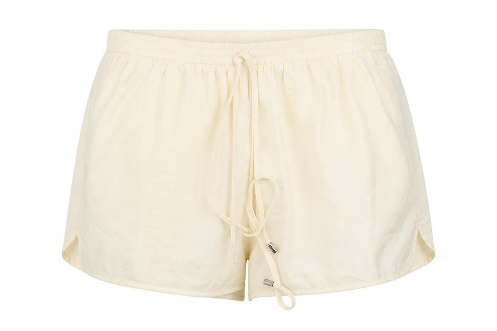 Front view of Missguided women’s beige hot pants shorts, size UK 10