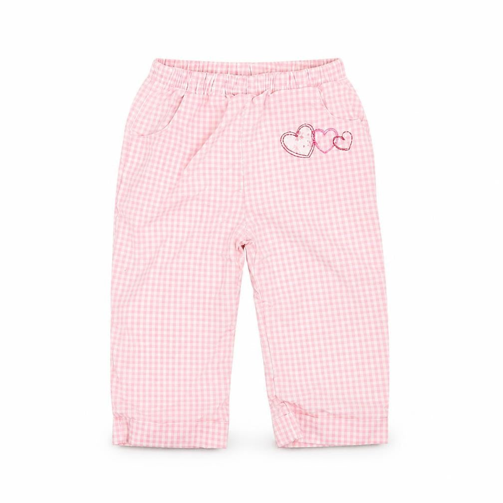 Front view of baby bruin girls’ pink check trousers, size 6-9, months