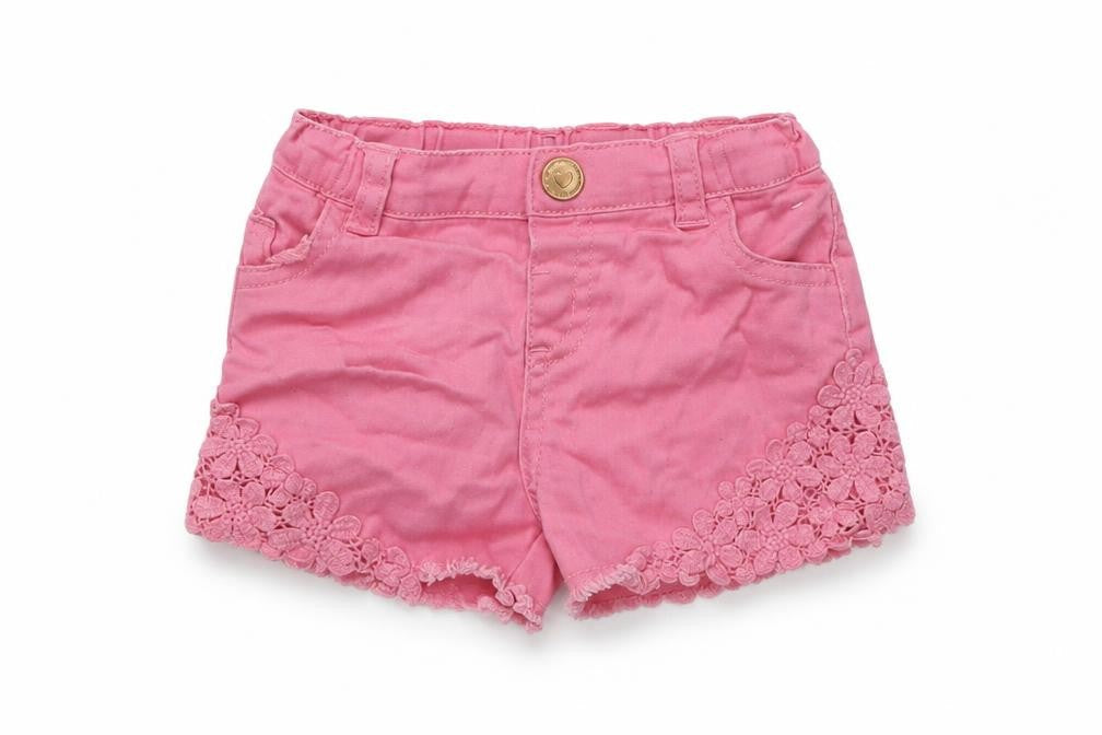 Front view of BABY GILR girls’ pink capri jeans, size 9-12, months