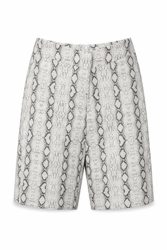 Front view of Missguided women’s white animal print hot pants shorts, size UK 6