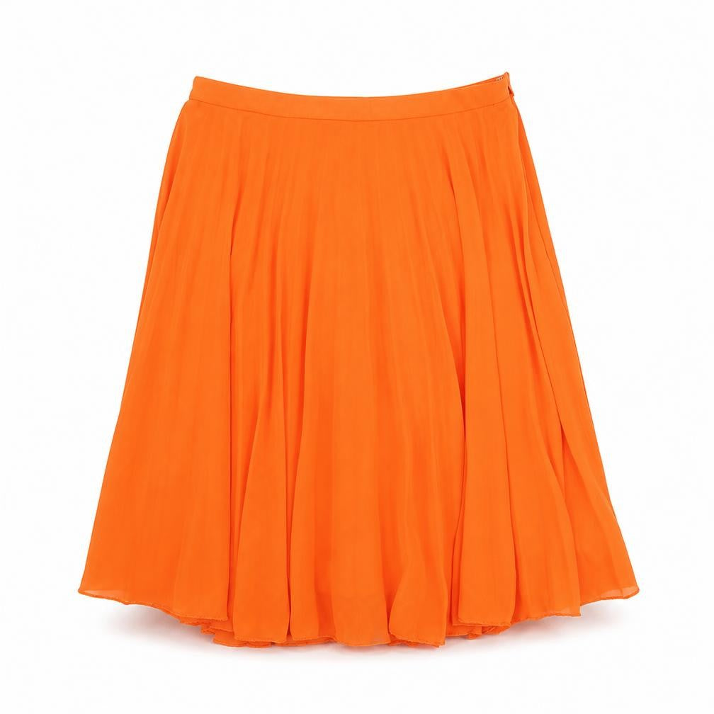 Front view of ASOS women’s orange polyester pleated skirt, size UK 6, zip