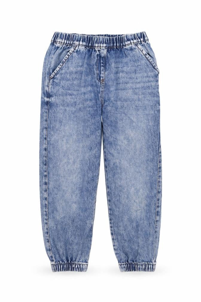 Front view of Next boys’ blue cork tapered jeans, size 9, months regular pullover