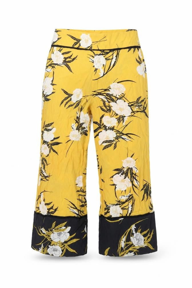Front view of Miss Selfridge women’s yellow floral viscose cropped trousers, size UK 8, 23-inch leg regular zip
