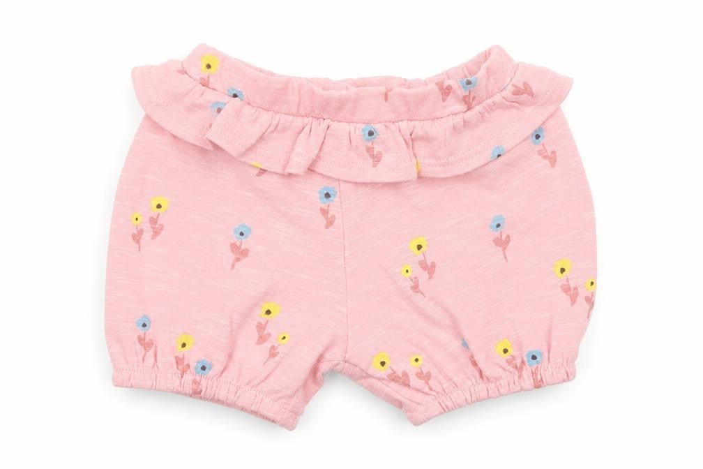 Front view of Marks & Spencer girls’ pink floral cotton cropped trousers, size 0-3, months pullover - 1 month, inside leg 2in