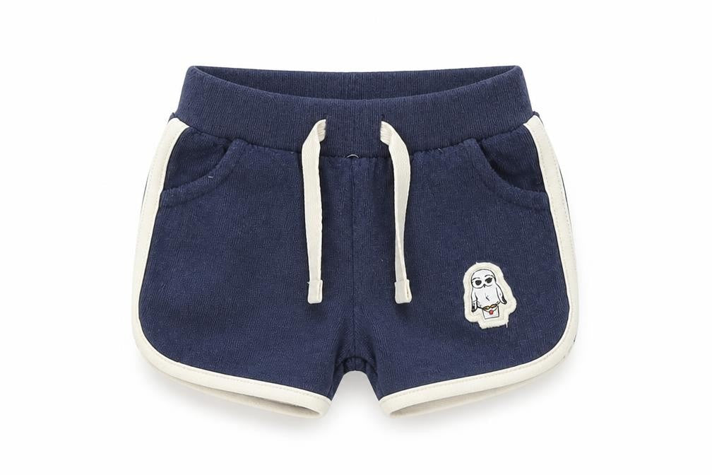 Front view of Marks & Spencer boys’ blue cotton jogger trousers, size 3-6, months drawstring - inside leg 2in