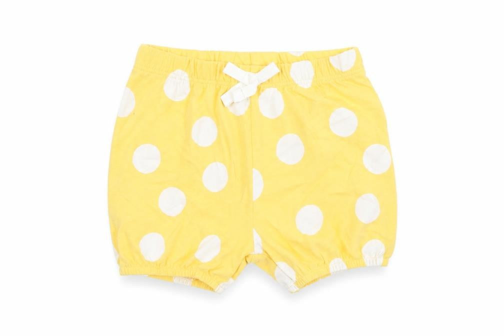 Front view of Marks & Spencer girls’ yellow polka dot 100% cotton sweatpants, size 6-9, months - elasticated waist bow detail