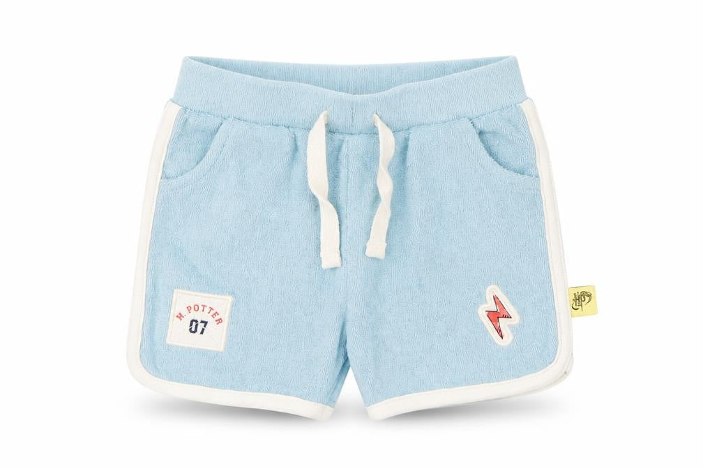 Front view of Marks & Spencer girls’ blue cotton cropped trousers, size 6-9, months pullover - shorts, harry potter