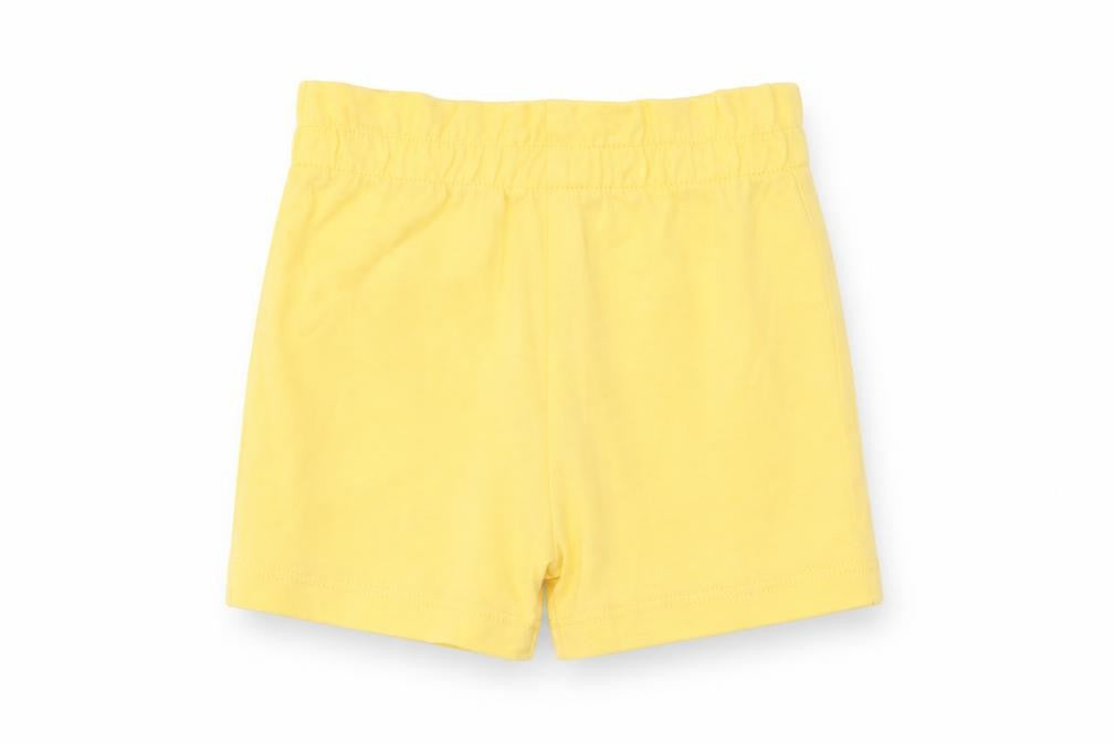 Front view of Marks & Spencer girls’ yellow cotton cropped trousers, size 3-6, months pullover - lemon