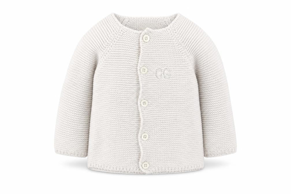 Front view of Toffee Moon girls’ white cotton cardigan jumper, size 6-9, months button - 6-12 months