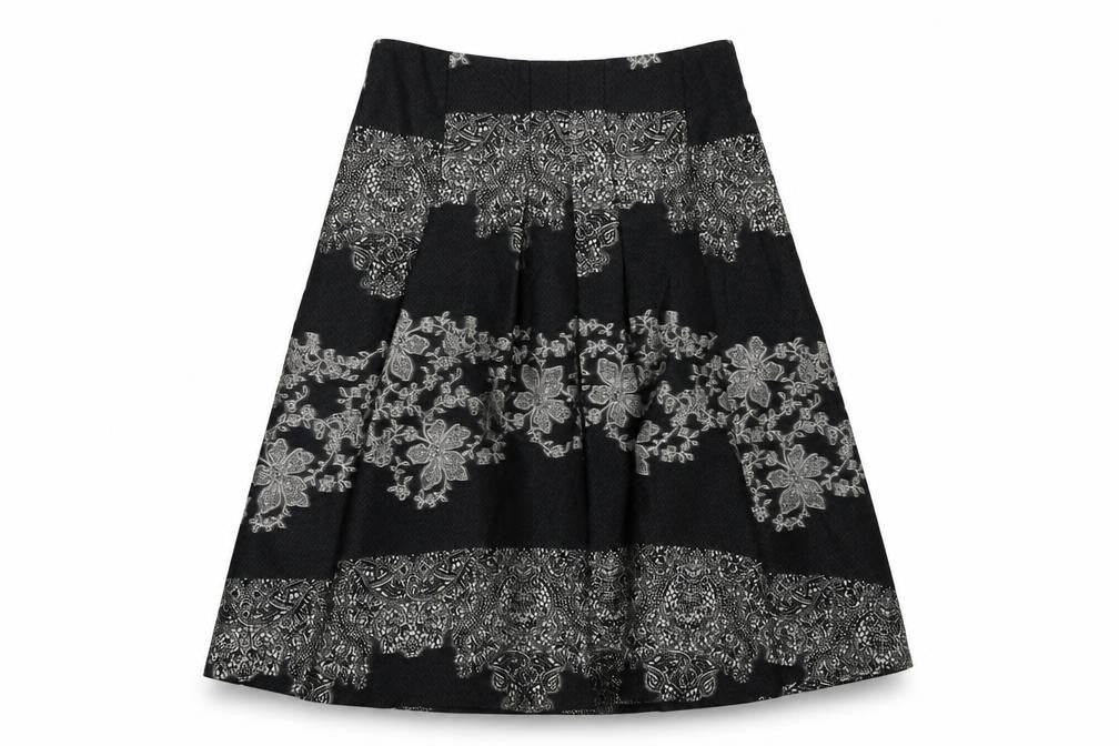 Front view of Kaliko women’s black geometric acetate a-line skirt, size UK 12, zip
