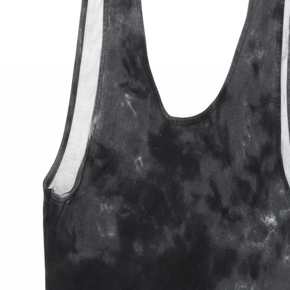 Close-up detail of ASOS women’s black geometric viscose bodycon, size UK 10, scoop neck pullover