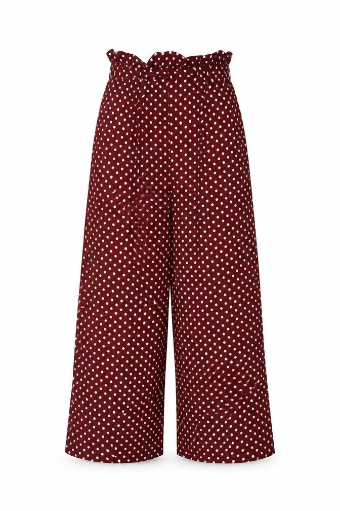 Front view of Miss Selfridge women’s red polka dot viscose trousers, size UK 6, 22-inch leg regular