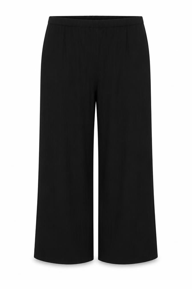 Front view of ASOS women’s black polyester trousers, size UK 16, 21-inch leg regular