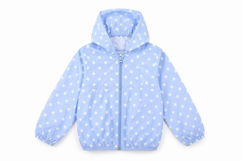 Front view of Benetton girls’ blue polka dot windbreaker jacket 3-4 years