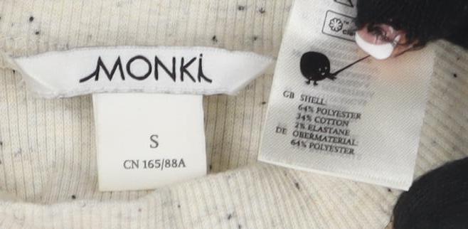 Close-up detail of Monki Beige Long Sleeve Mock Neck T-Shirt S