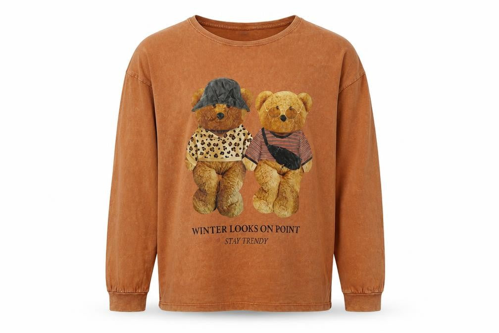 Front view of Zara girls’ orange long sleeve bear graphic t-shirt 13-14 years