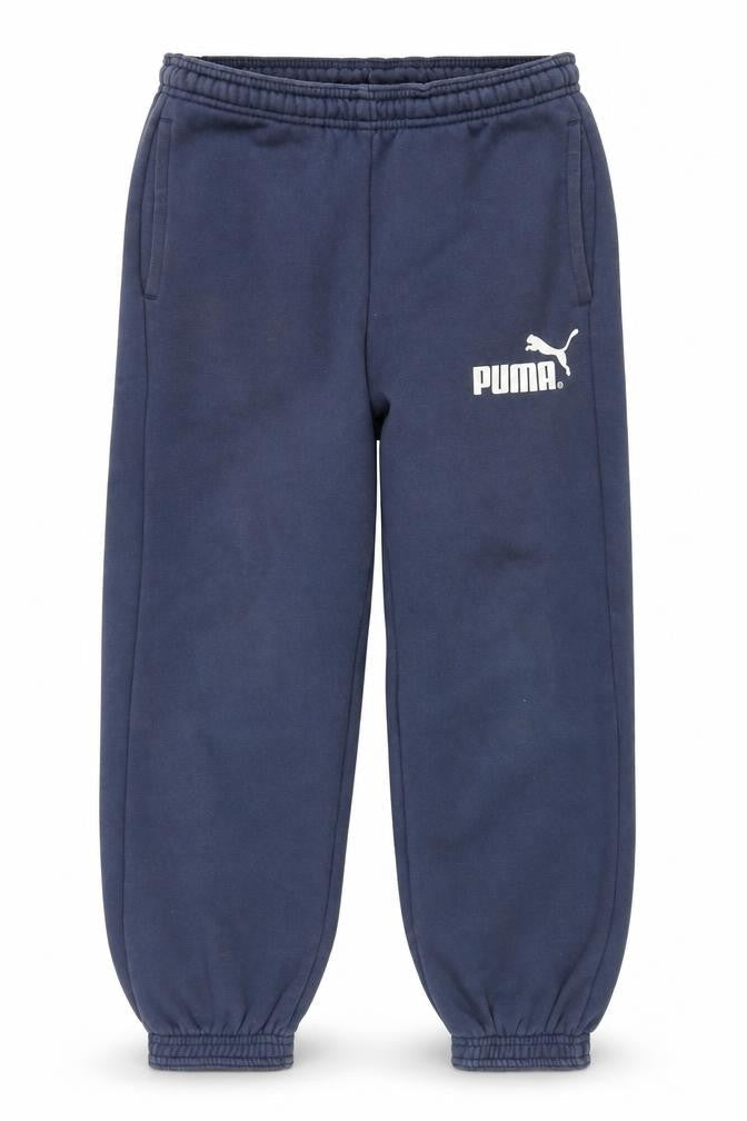 Front view of Puma boys’ blue jogger trousers cotton blend, size 8