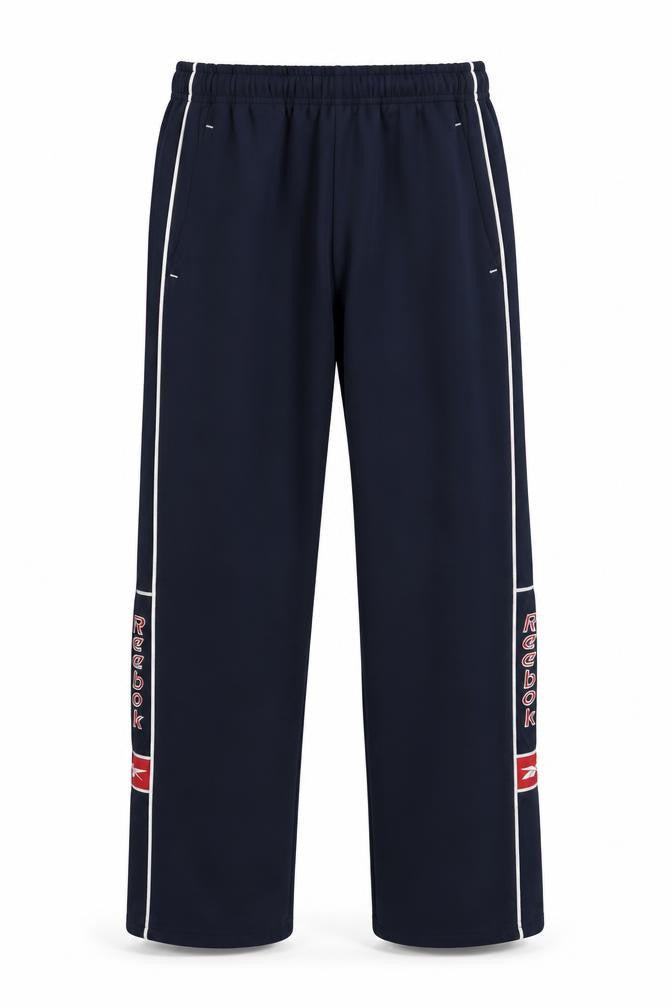 Front view of Reebok boys’ black track pants jxl elastic waist sports