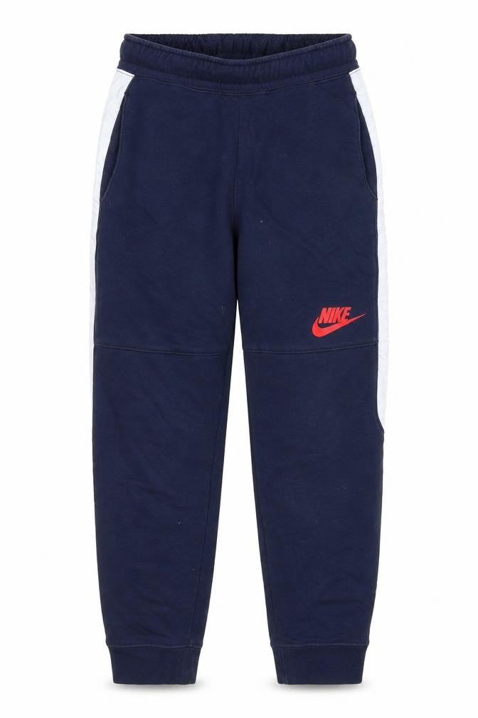 Front view of Nike boys’ blue jogger trousers, size M, cotton blend